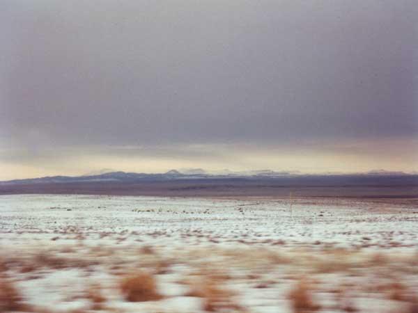 Colorado - weites Land mit mit Schneewolken
Colorado Abenteuer Reise - tiefe Schneewolken - dunkle Farben - und das weite Land